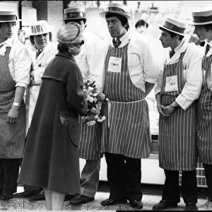 Queen Elizabeth II in Merseyside speaking with local workers