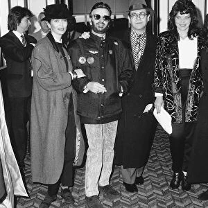 Ringo Starr with Elton john the singer with wife and friends about to board a concorde to