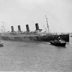 RMS Aquitania seen here leaving Southampton with a crew of volunteer stewards The