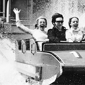 Roy Orbison American singer on a water chute at the Battersea Pleasure Gardens in London