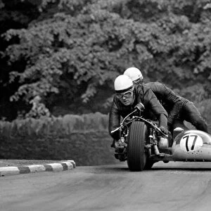 Sport Motorcycling: Isle of Man TT Racing 750 CC Sidecar Class. Action from the race