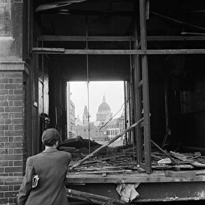 St Pauls Cathedral seen through a blasted shop on Fetter Lane. 4th August 1944