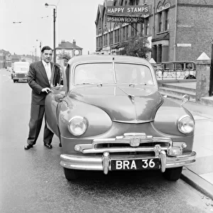 Standard Vanguard car with humourous registration number plate BRA 36. 1955