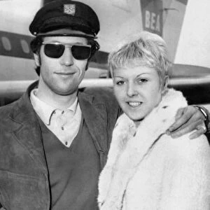 Welsh singing star Tom Jones pictured with his wife Linda after arriving from France