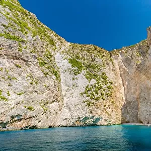 Greece, cliff landscape with sea as travel destination island with blue sky. Idyllic shoreline in Greece, Zakynthos