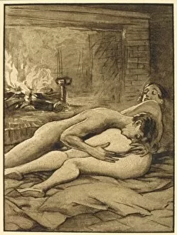 Couple making love in front of an open fire