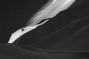 Backcountry Skier Splitboarding In The Tordrillo Mountains, Southcentral Alaska Backcountry Skier Splitboarding In The Tordrillo Mountains, Southcentral Alaska