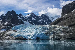 Blue Glacier Between Snow-Capped Mountains And Fjord; Antarctica Blue Glacier Between Snow-Capped Mountains And Fjord; Antarctica