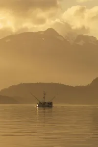 A Commercial Fishing Vessel Long Line Heads South In Lynn Canal Near Juneau, Alaska A Commercial Fishing Vessel Long Line Heads South In Lynn Canal Near Juneau, Alaska
