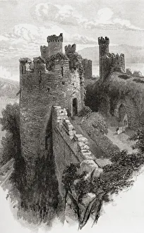 Conwy Castle, Conwy, Wales. The Bakehouse tower, seen here in 1880 before recontruction repairs began Conwy Castle, Conwy, Wales. The Bakehouse tower, seen here in 1880 before recontruction repairs began