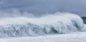 Huge Waves Crash Along The Beach At Djupalonssandur, Snaefellsnes Peninsula; Iceland Huge Waves Crash Along The Beach At Djupalonssandur, Snaefellsnes Peninsula; Iceland