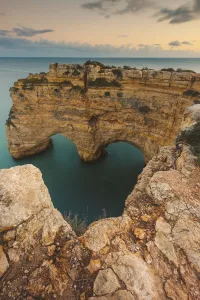 Iconic rock formation, Arcos Naturais, Praia da Marinha, Algarve, Portugal Iconic rock formation, Arcos Naturais, Praia da Marinha, Algarve, Portugal