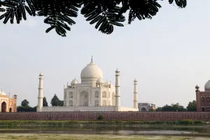 India, Temple burial site seen from Yamuna River at sunset; Agra, Taj Mahal India, Temple burial site seen from Yamuna River at sunset; Agra, Taj Mahal