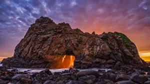 Keyhole Rock at sunset, on Pfeiffer Beach ,which is along the Big Sur coast of California, USA Keyhole Rock at sunset, on Pfeiffer Beach ,which is along the Big Sur coast of California, USA