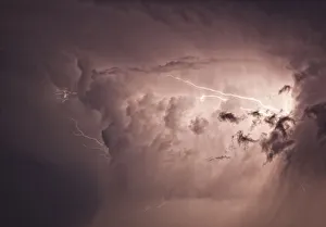 Lightning Arcs Between Clouds During A Storm; Saskatchewan, Canada Lightning Arcs Between Clouds During A Storm; Saskatchewan, Canada