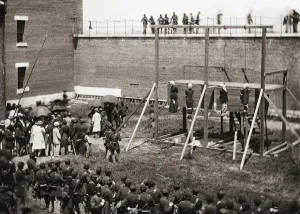 Mary Surratt, Lewis Powell, David Herold, and George Atzerodt hanging from the gallows at Fort McNair, Washington D.C Mary Surratt, Lewis Powell, David Herold, and George Atzerodt hanging from the gallows at Fort McNair, Washington D.C