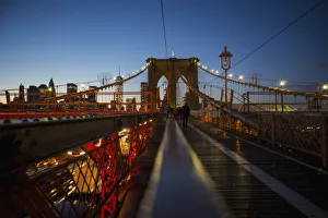 Pedestrian Path On Brooklyn Bridge Heading Into Manhattan At Night; New York City Pedestrian Path On Brooklyn Bridge Heading Into Manhattan At Night; New York City