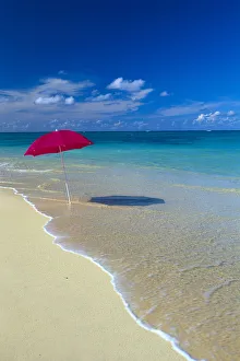 Red Beach Umbrella In Shoreline Waters, Clear Turquoise Water B1455 Red Beach Umbrella In Shoreline Waters, Clear Turquoise Water B1455