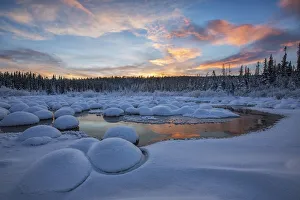 Red clouds at sunset over mcintyre creek; Whitehorse, yukon, canada Red clouds at sunset over mcintyre creek; Whitehorse, yukon, canada