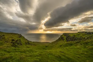 Sunset over the Atlantic Ocean which dramatic clouds, Snaefellsness Peninsula; Iceland Sunset over the Atlantic Ocean which dramatic clouds, Snaefellsness Peninsula; Iceland