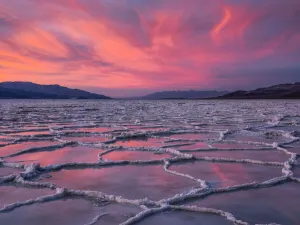 Sunset over the Badwater salt flats on Death Valley National Park, California, USA Sunset over the Badwater salt flats on Death Valley National Park, California, USA
