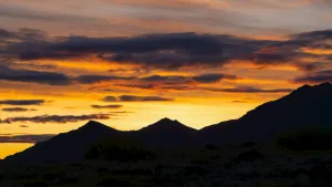 Sunset over the mountains of the Yukon's Dempster Highway, Canada Sunset over the mountains of the Yukon's Dempster Highway, Canada