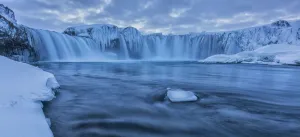 The Waterfall Godafoss In Northern Iceland Seen In The Winter At Sunset; Iceland The Waterfall Godafoss In Northern Iceland Seen In The Winter At Sunset; Iceland